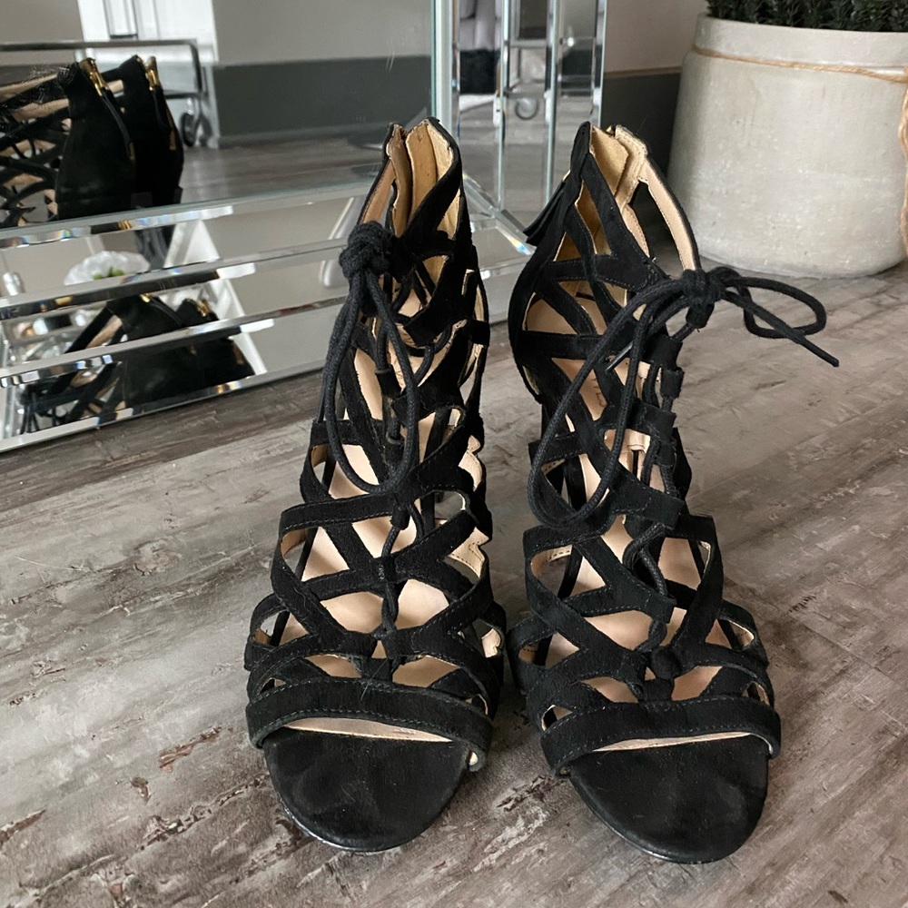 Black strapped heels.